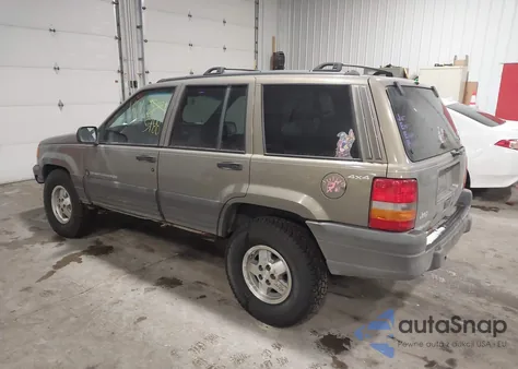 1997 Jeep Grand Cherokee Laredo/Tsi из США, поврежденный, VIN 1J4GZ58S3VC777456